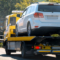 Car on Flat Bed Tow Truck